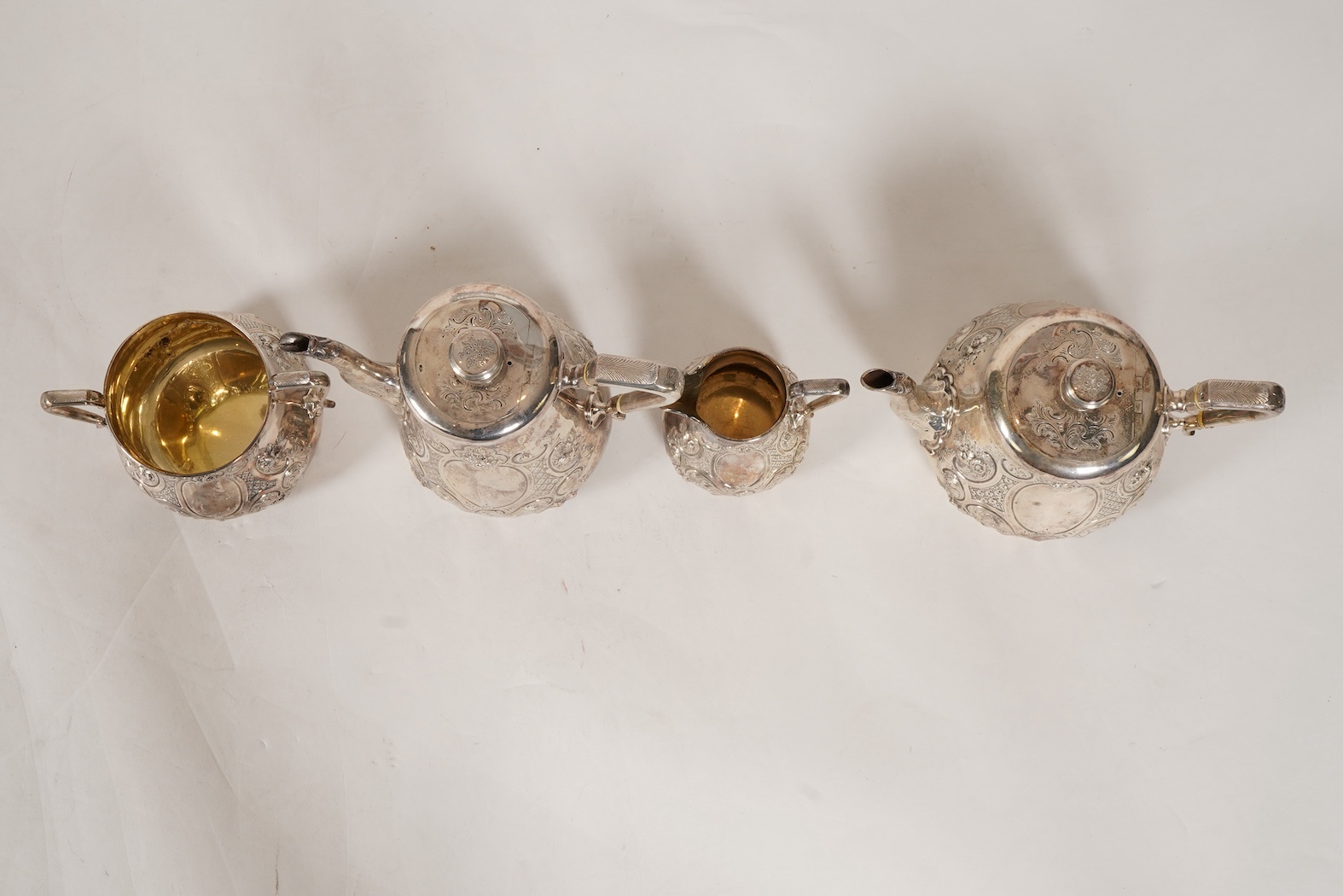 A Victorian embossed silver four piece tea and coffee service by Daniel & Charles Houle